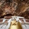 Buddha statue with carvings in Kaw Goon cave in.