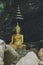 Buddha statue in cave thailand