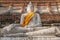 Buddha statue in front of Stupa at Wat Yai Chai Mongkhon, Ayutthaya, Thailand, Unesco World Heritage Site