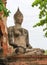 Buddha statue in meditate bhumisparsha mudra posture