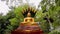 Buddha statue with panning in a garden