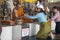 He buddha statue sits on top of the Nakkerd Hills. Big Buddha Phuket. Buddhist holy monk in saffron dress blessing tourists in the