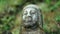 Buddha statue in South Asia close up view.