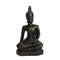 Buddha statue on white background sitting peaceful in meditation posture