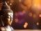 buddha statue on a wooden table in a dark background