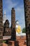 Buddha statues and brick columns in the muangboran museum are a popular tourist