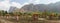 Buddha Statues in a green field at the base of Mount Zwegabin near Hpa-An, Myanmar.