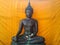Buddha stutie in background uniform monk bangkok thailand
