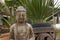 Buddha welcoming the tourist on a terrace