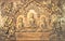 Buddha wooden carving.Mural paintings tell the story about the Buddha`s history