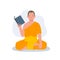 Buddhism Education Concept. Serene Thai Monk in Traditional Robes with book