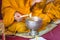 Buddhism monks are pray and formalize the holy water or the blessed water