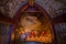 Buddhism monks praying with candle light at Shwesandaw temple