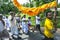 A Buddhist ceremony moves along a road near Matale in central Sri Lanka.