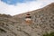 Buddhist Chorten for protection from evil spirits stand on a hill.