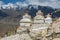 Buddhist chortens or stupas and Himalayas mountains in the background near Shey Palace