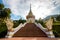 Buddhist monastery , naga statue on stair at temple . cloudy and blue sky background .