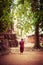 Buddhist monk at ancient Wat Mahathat. Ayutthaya, Thailand