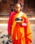 Buddhist Monk with begging bowl