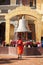 Buddhist monk with begging bowl at Boudhanath Stupa. Nepal, Kathmandu