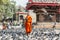 Buddhist monk with begging bowl in Durbar Square, Kathmandu, Nepal