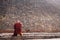 Buddhist monk at Buddha\'s cremation stupa in a foggy morning, Kushinagar, India