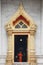 Buddhist monk entering temple at Wat Benchamabophit Dusitvanaram, Bangkok, Thailand