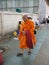 The Buddhist monk going along streets of the market