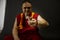 Buddhist monk holding a glass ball in his hand