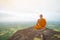 Buddhist monk in meditation at beautiful nature