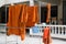Buddhist monk orange clothes hang dry on robe line