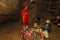 a Buddhist monk performs a ritual in a cave near the city of Pa