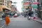 Buddhist monk walks barefoot down Khao San Road Bangkok