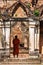 Buddhist Monk in Wat Si Sawai temple in Sukhotai, Thailand