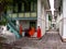 Buddhist monks converse outside their home at Wat Benchamabophit temple in Bangkok, Thailand