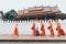 Buddhist monks during Laotian traditional sacred alms giving ceremony in Luang Prabang city, Laos