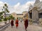 Buddhist monks at Phra Borom Maha Ratcha Wang, Grand Palace in Bangkok