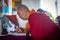 Buddhist monks are praying in an ancient Buddhist temple in Siberia