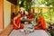 Buddhist monks of a riverside temple in Kampot, Cambodia