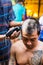 Buddhist monks shave their hair to be ordained
