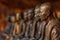 Buddhist monks statues symbol of peace and serenity at Wat Phu Tok temple, Thailand, asceticism and meditation, buddhist art work