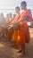 Buddhist novices waiting for food offering in morning