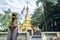 Buddhist pagoda surrounded by Buddhist flags in Burmese village