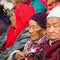 Buddhist pilgrims near stupa Boudhanath during festive solemn Puja