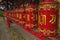 Buddhist prayer drums red and yellow, religious mantras