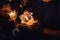 Buddhist praying with incense sticks, lotus flower and candles on holy religion day of Vesak at night.