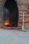 Buddhist ritual of exorcising evil spirits through the explosion of firecrackers near the temple.