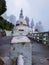 Buddhist shanti stupa covered with cloud at morning from different angle