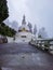 Buddhist shanti stupa covered with cloud at morning from different angle