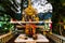 Buddhist spirit house with offerings in Bangkok, Thailand, 2019